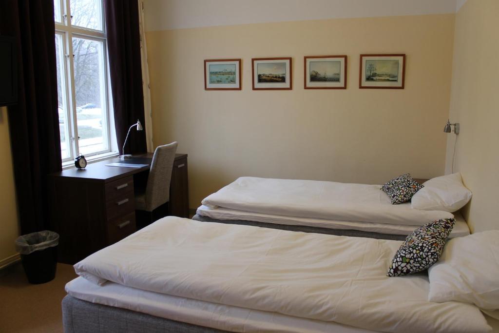 Stationshusets Hotell Och Cafe Köping Zimmer foto